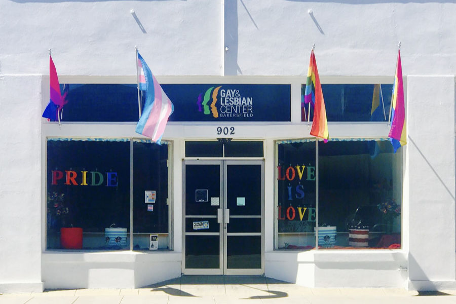 Front of The Center for Sexuality & Gender Diversity in Bakersfield with pride decor and a white storefront.