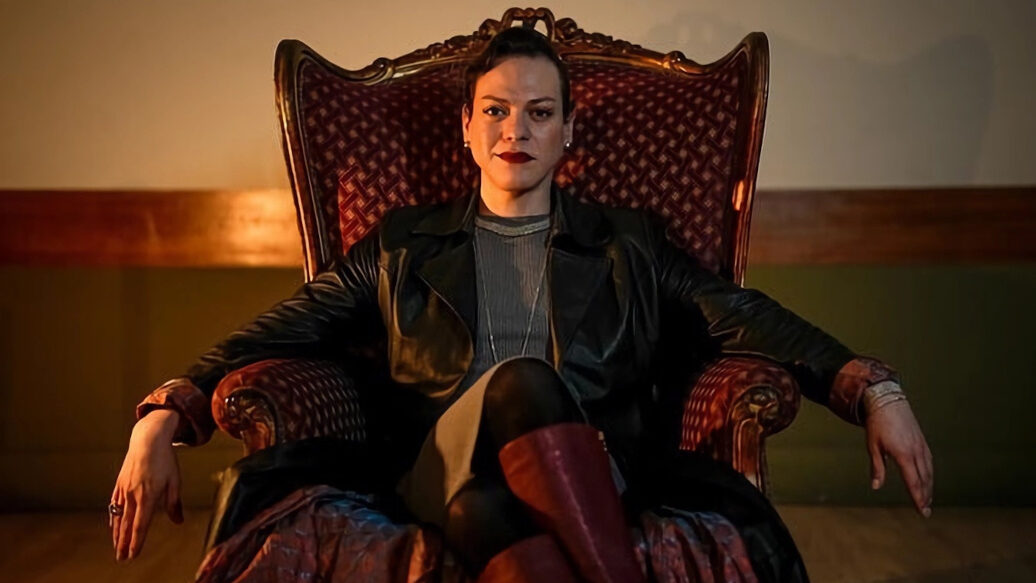Daniela Vega seated in an ornate red chair, wearing dark leather and boots, shot for La República in Lima, Peru.
