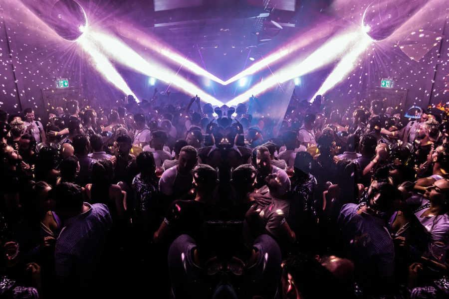 Crowded dancefloor under purple lights at Mother Club, Dublin’s iconic LGBTQ+ party, in January 2023.