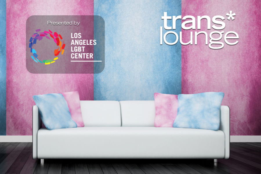 White couch with trans flag pillows in the Trans* Lounge, created and presented by the Los Angeles LGBT Center.